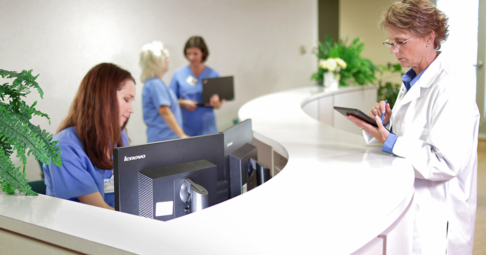 Product_ADA_Lenovo Reception desk at medical office with Lenovo monitors
